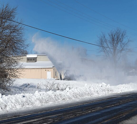 Winter scene with smoke and snow